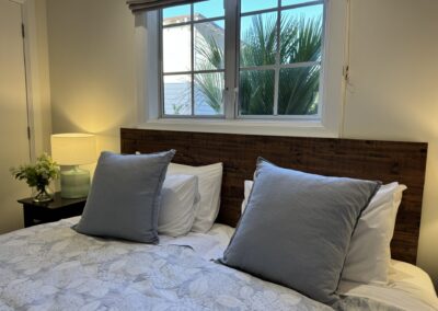 Ground floor master bedroom layout configured with a luxury Super King bed at Crab Shack Cottage.
